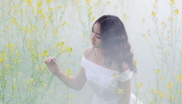 Lady in a flower meadow